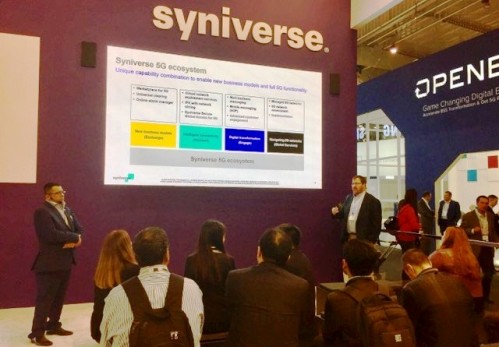 John Merchant co-leading a seminar on 5G at the Syniverse booth at MWC Barcelona.